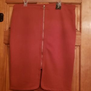 Burnt orange front zip knee length skirt